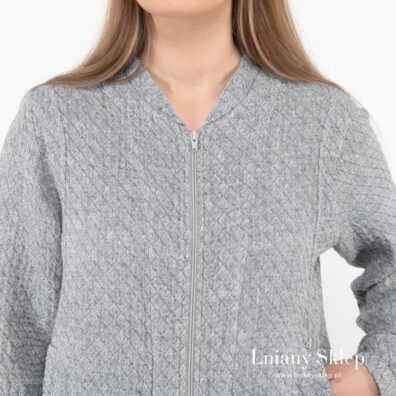 Szary żakiet bomber zapinany na zamek błyskawiczny.