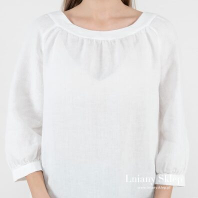 Biała bluzka marszczona przy dekolcie i mankietach.