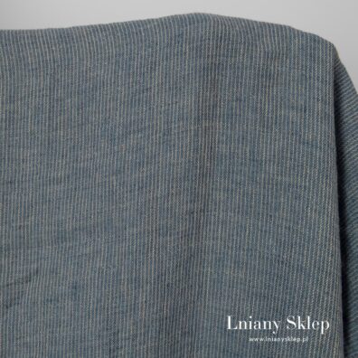 Tkanina wytkana a przędzy granatowej i piaskowej w szarość.