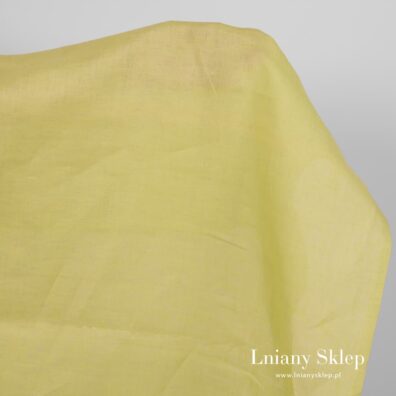 Gładko wytkana zielona tkanina lniana.