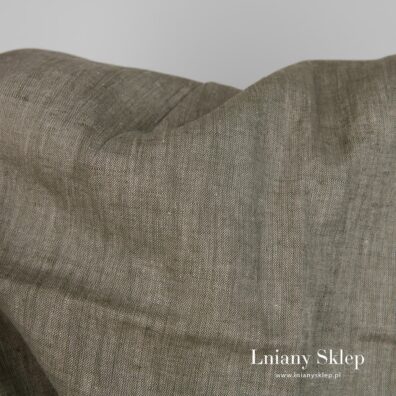 Tkanina wytkana w melanżu z zielonej i niebarwionej lnianej przędzy.