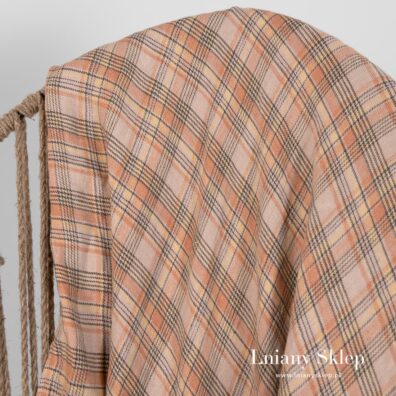 Pled wytakany z brązowej, pudrowej, żółtej i szarej przedzy.