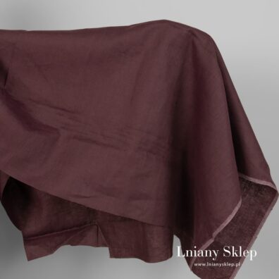 Brązowa w fiolet tkanina lniana.