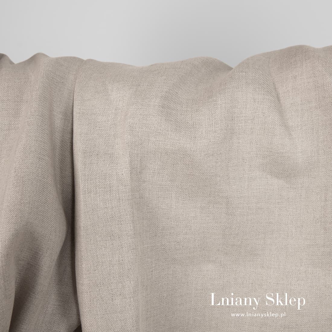 Tkanina z niebarwionej przędzy lnianej.