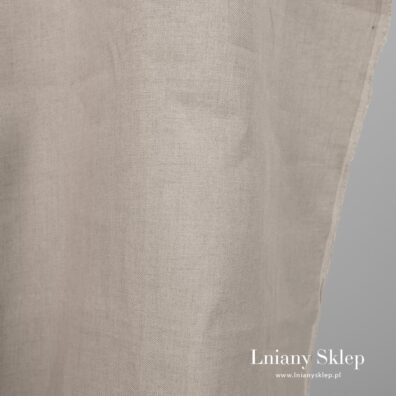 Niebarwiony len wytkany splotem skośnym.