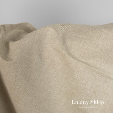 Piaskowa w zieleń tkanina na odzież i tekstylia domowe.