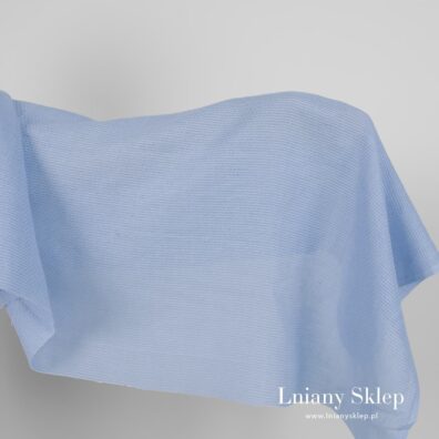 Jasnoniebieska w wypukły wzór tkanina len i bawełna