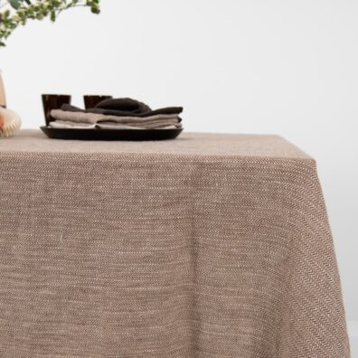 Tkanina wytkana z brązowego i niebarwionego lnu.