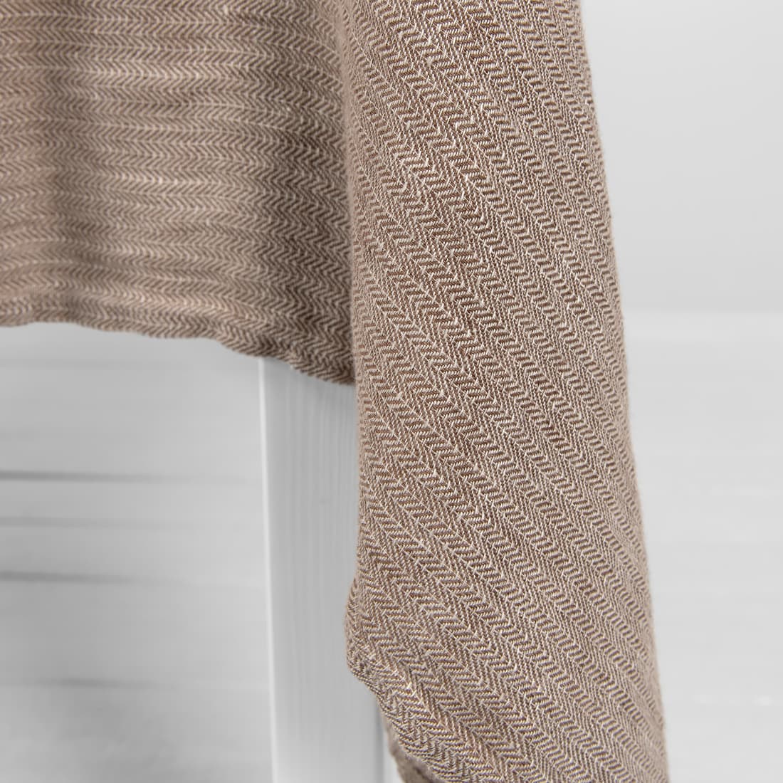 Tkanina wytkana splotem jodełkowym.