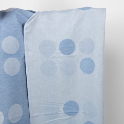 Żakardowy dwustronny len w duże grochy.