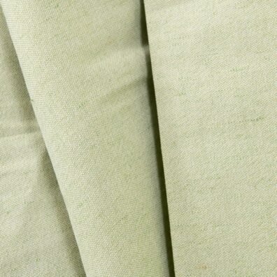 Jasnozielona tkanina wytana splotem Panama.