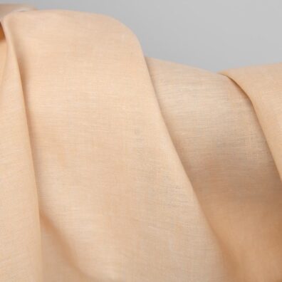 Leciutko żółtawa tkanina lniana na odzież i tekstylia domowe.