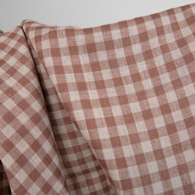 Szaro - brązowy len w kratkę na odzież i tekstylia domowe.