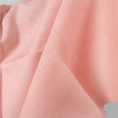 Gładko wytkana różowa tkanina lniana