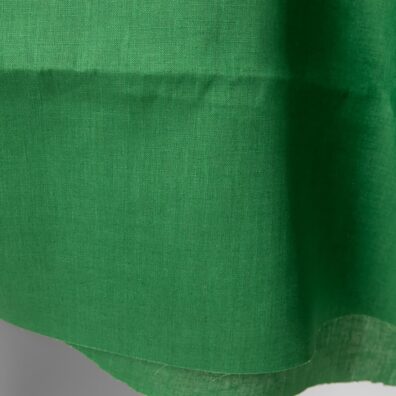 Zielona, gładko wytkana tkanina lniana
