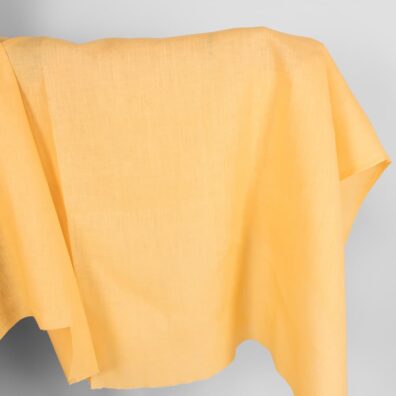 Jasna żółta tkanina lniana