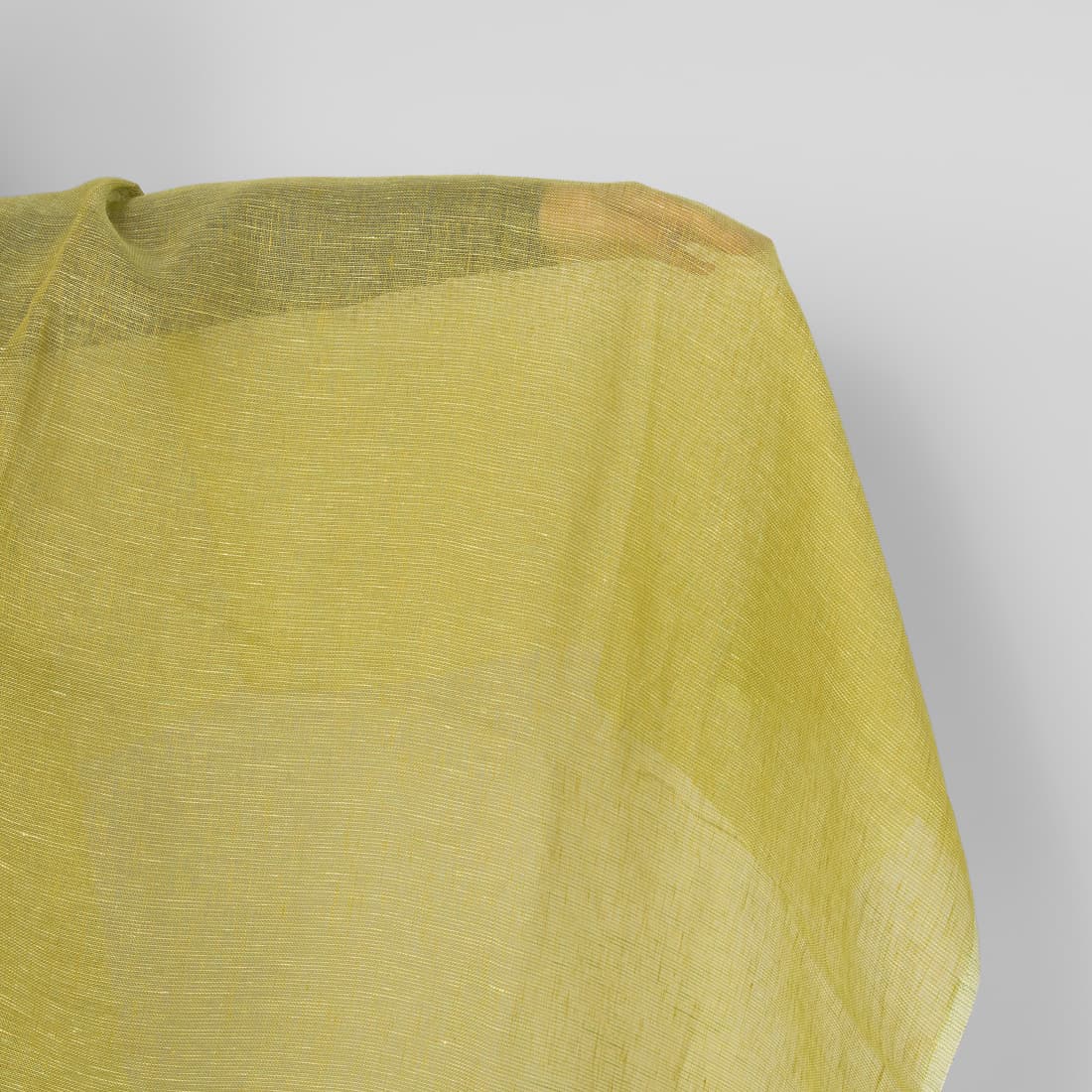 Przeźroczysta żółta w zieleń tkanina lniana