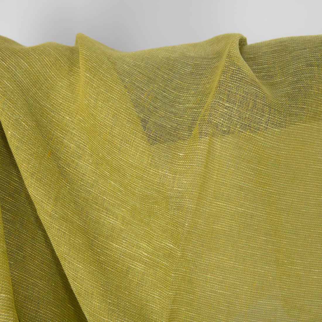 Zielnokawy prześwitujący len