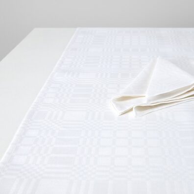 Śnieżnobiały w krateczkę bieżnik stołowy