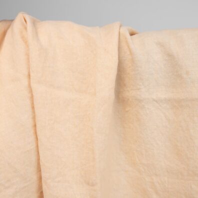 pellava valkoinen keltainen pesty kangas