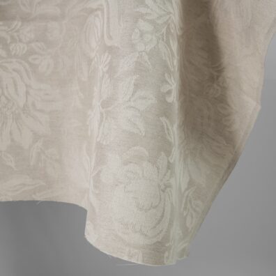 Beige pellava-puuvillakangas jacquard jossa on kukkia