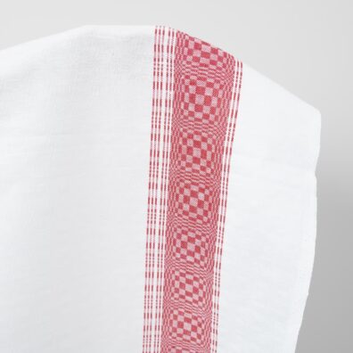 Valkoinen ruudullinen puolipellavainen kangas jossa on punainen raita soveltuu vaatteiden ja kodintekstiilien ompeluun