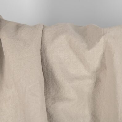 Puolipellavakangas beige melanssi pesty soveltuu vaatteiden ja kodintekstiilien ompeluun