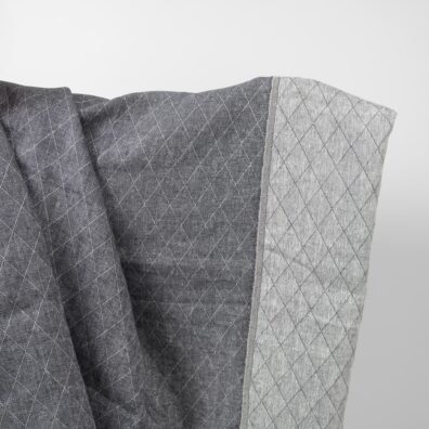 Sininen kaksipuolinen pellavakangas jossa on timanttikuvio