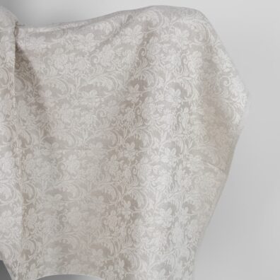 Beige puolipellavainen kangas jacquard jossa on kukkia