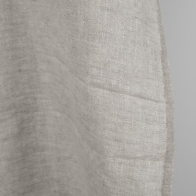 Vaaleanharmaa pellavakangas jossa on ajour-rombeja soveltuu vaatteiden, ompeluun