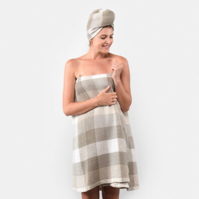 Ruudullinen hiekanvärinen puuvillainen pellavapyyhe yhteensopivan hiuspyyhkeen kanssa