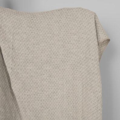 Puolipellavakangas ruskehtavan harmaa timanttikuvioinen pesty