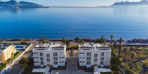Exclusive new-build apartment on the seafront in Puerto Pollenca (Thumbnail 1)