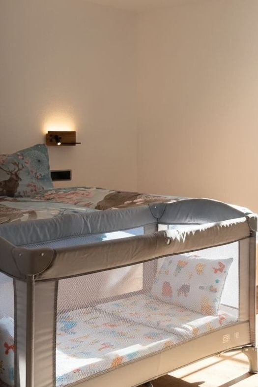 Reisebett mit Bettwäsche - geborgen schlafen von Anfang an