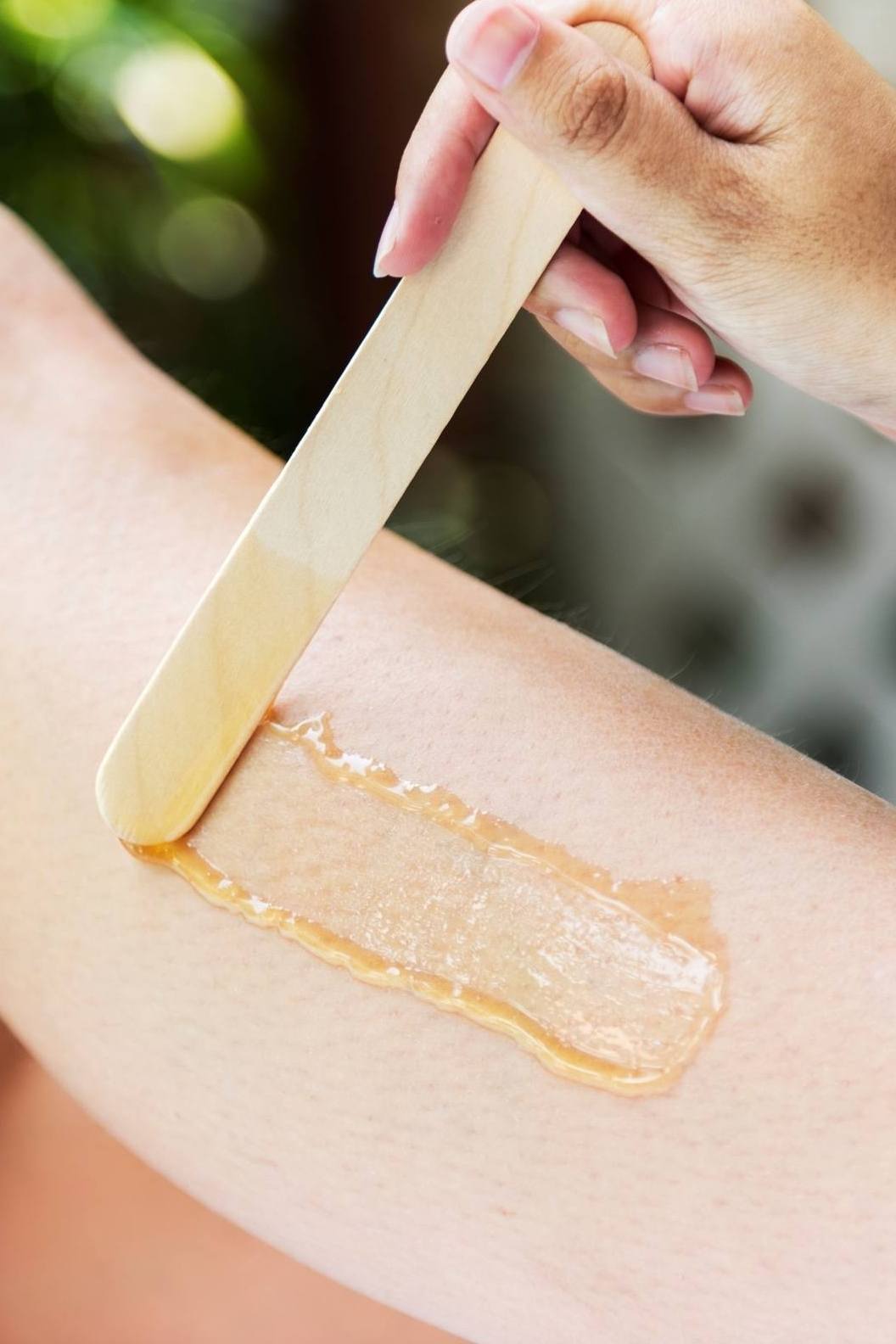 Hair removal with warm wax