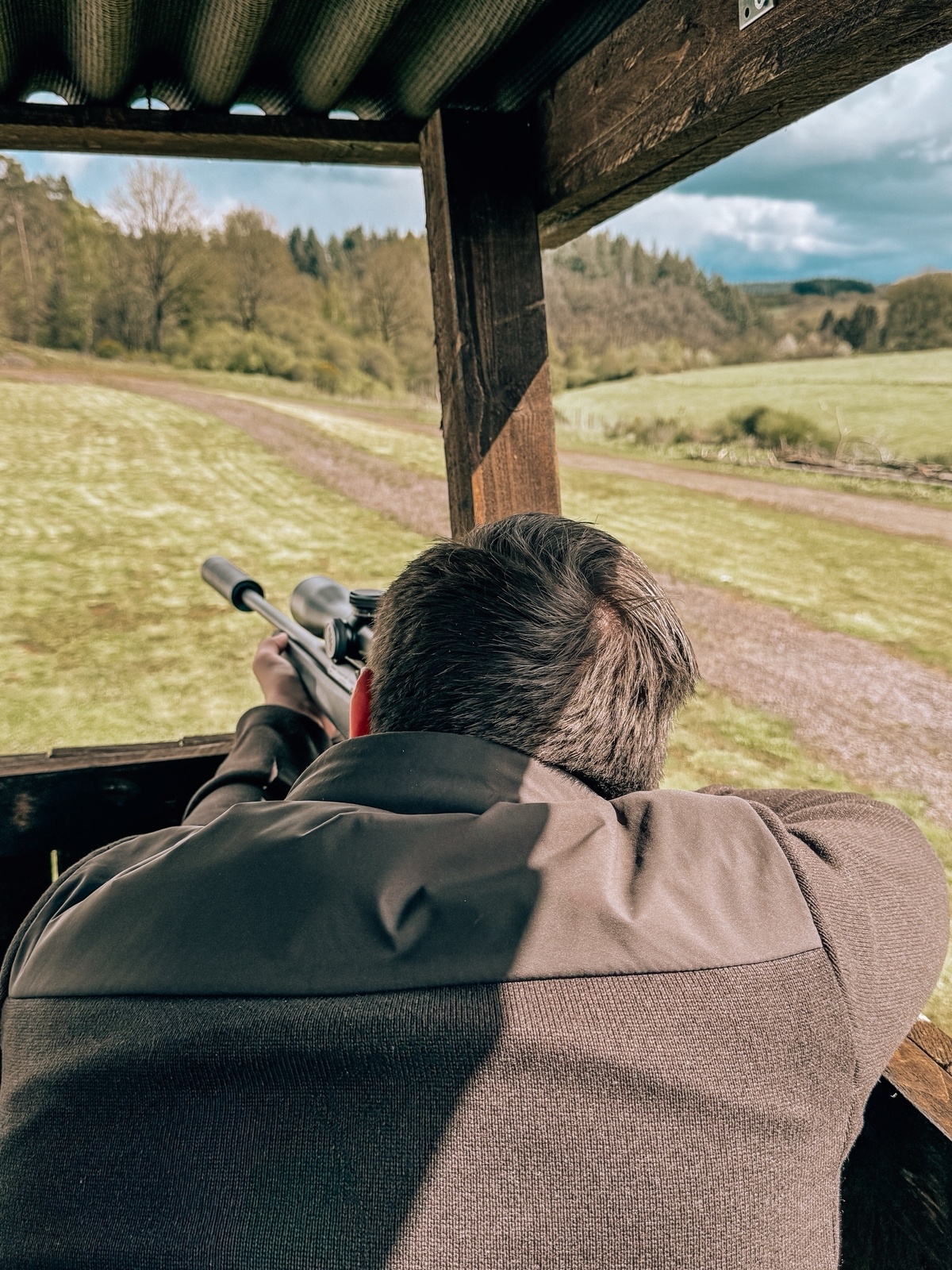 Shooting the rifle under instruction