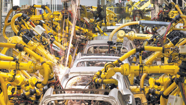 Robot czy człowiek? Automatyzacja wciąż idzie naprzód