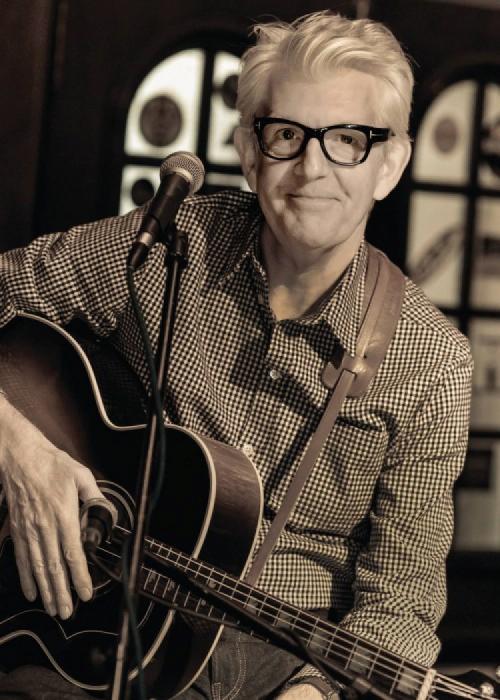 Cartel de Concierto de Nick Lowe en Sevilla