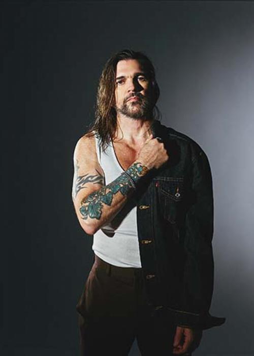 Cartel de Concierto de Juanes en Málaga