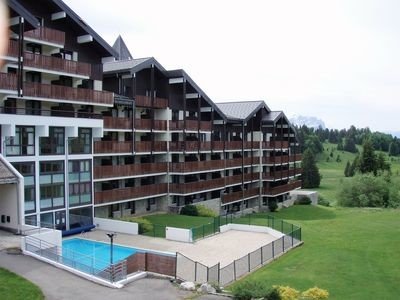 Duplex design, 2 chambres, avec piscine