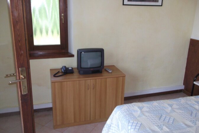 Camera 8 ospiti, con giardino