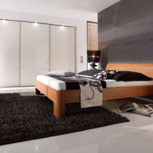 Alegerea locului ideal pentru patul din lemn masiv în dormitor