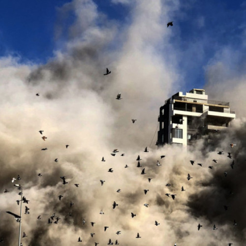 O clădire de 11 etaje s-a prăbușit în Beirut după un atac aerian israelian