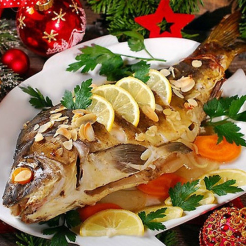 Tradiții culinare de Anul Nou: Pește și struguri pentru un an plin de noroc