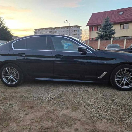 BMW 520 dezmembrat găsit în curtea unui tânăr din Botoșani