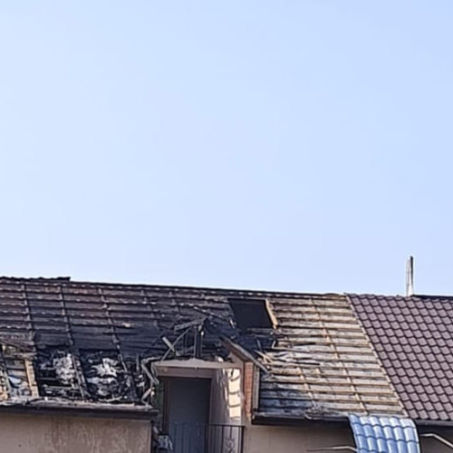 incendiu în român, provocat de un fumător neglijent