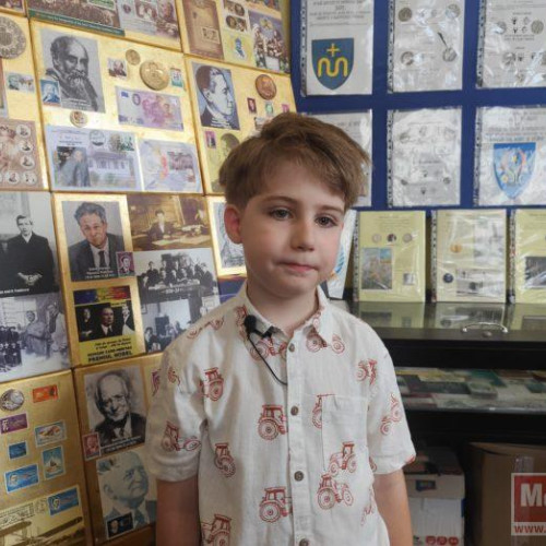 Un băiat de opt ani din Botoșani devine membru al Societății Naționale de Numismatică