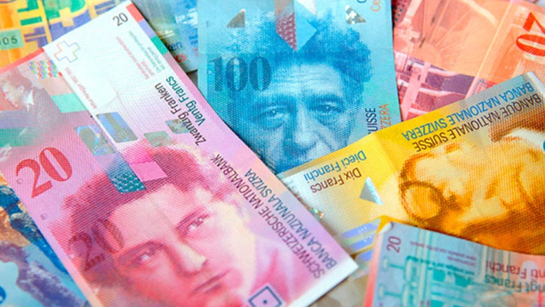 Cererea de franc elvețian atinge maxime istorice pe fondul tensiunilor globale