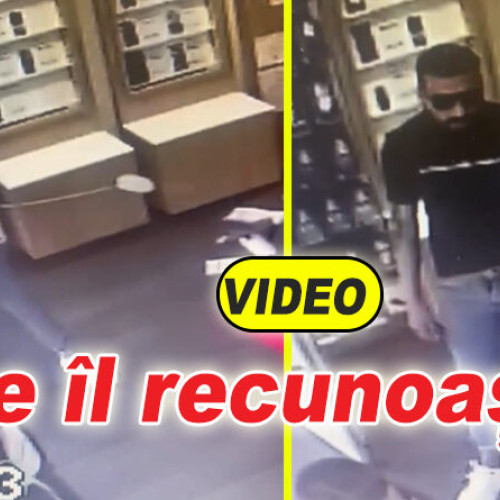 Individul căutat de poliție pentru furt la magazinul Vodafone din centrul Buzăului, surprins de camerele de supraveghere în timp ce rup cârligul anti-furt cu forța.