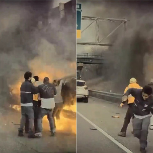 Video: Șofer dramatic salvat din mașina cuprinsa de flăcări pe autostrada din St. Paul, Minnesota